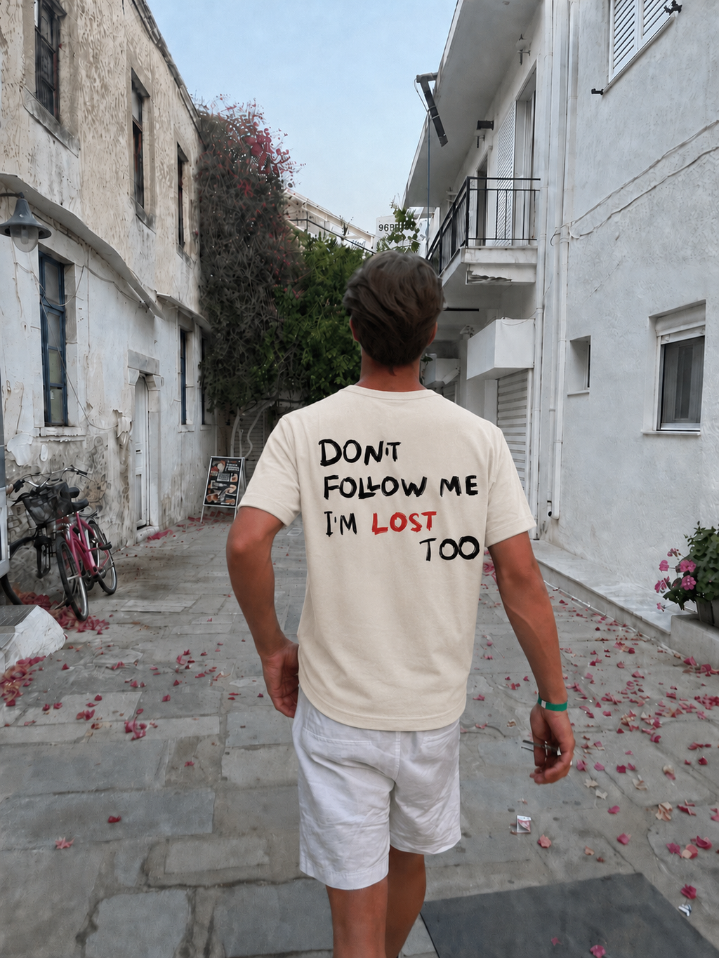 Don't Follow Me I'm Lost Too beige T-shirt worn in a street